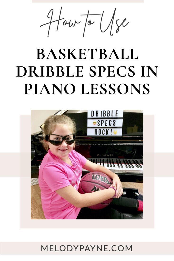 Cute piano student holding a basketball and wearing basketball dribble glasses