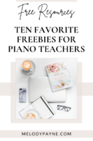 Laptop, piano studio policies, latte, coffee on a desk