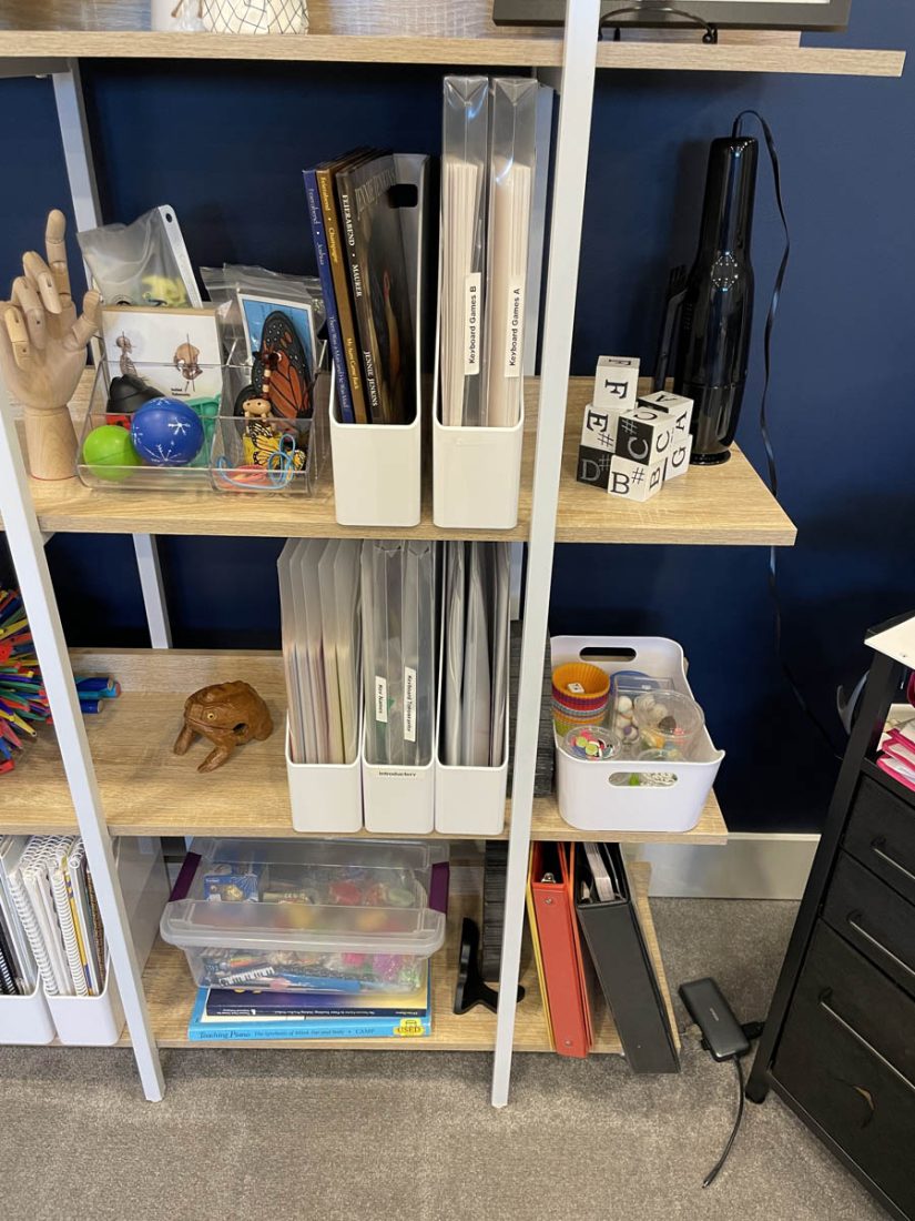 Organize piano games on a shelf